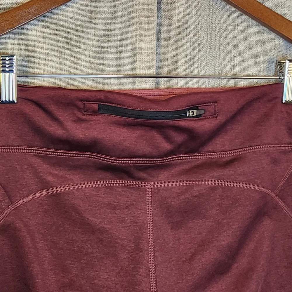 Nike Dri-FIT Running Leggings Women's L Burgundy Colorblock Ankle Zipper Pocket‎